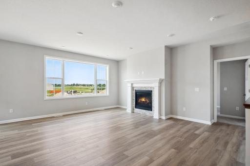Family Room. Photo is a completed home for illustrative purposes. Personalize this home with your chosen finishes.