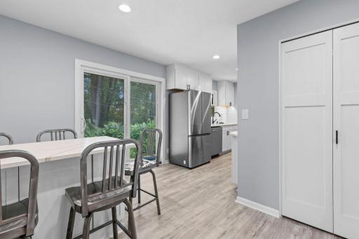 Living area leads into the light and bright dining and kitchen space