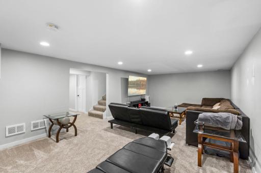 Light and bright lower level family room and rec space