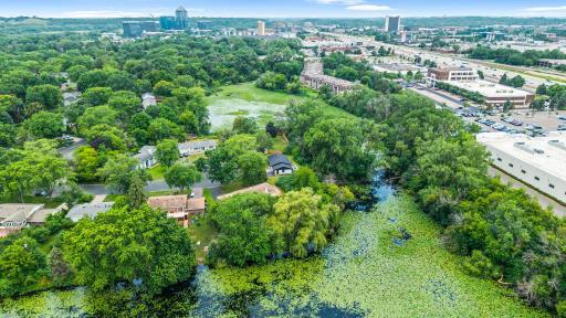 Aerial view of the neighborhood - a great location surrounded by tree coverage, yet close to Bloomington amenities