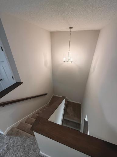Thoughtful open stair design creates a seamless transition between levels.