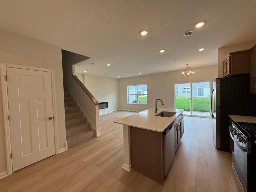 Another look at the main level kitchen, dinette, and living areas.