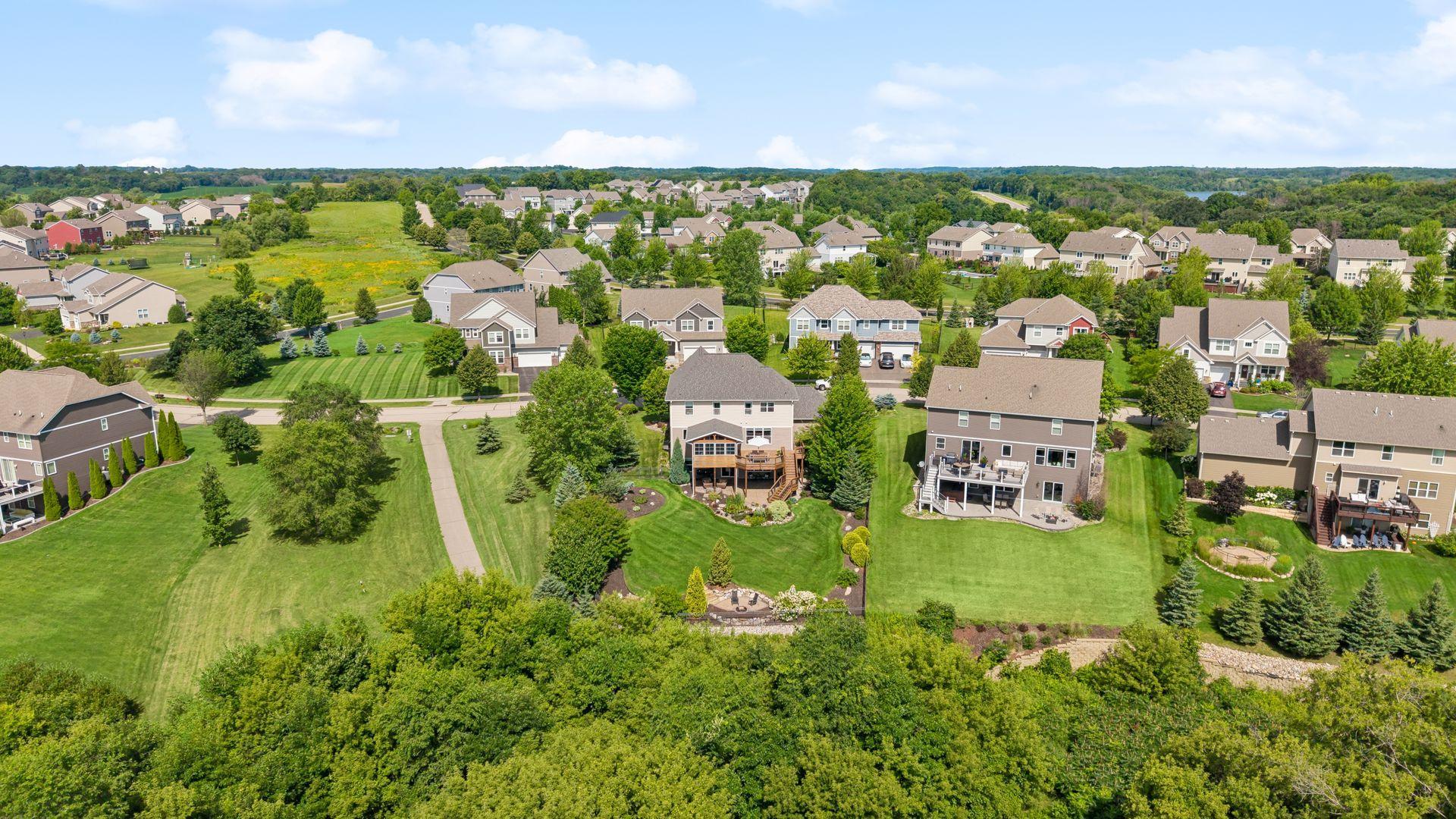 Beautifully landscaped rear of home from above