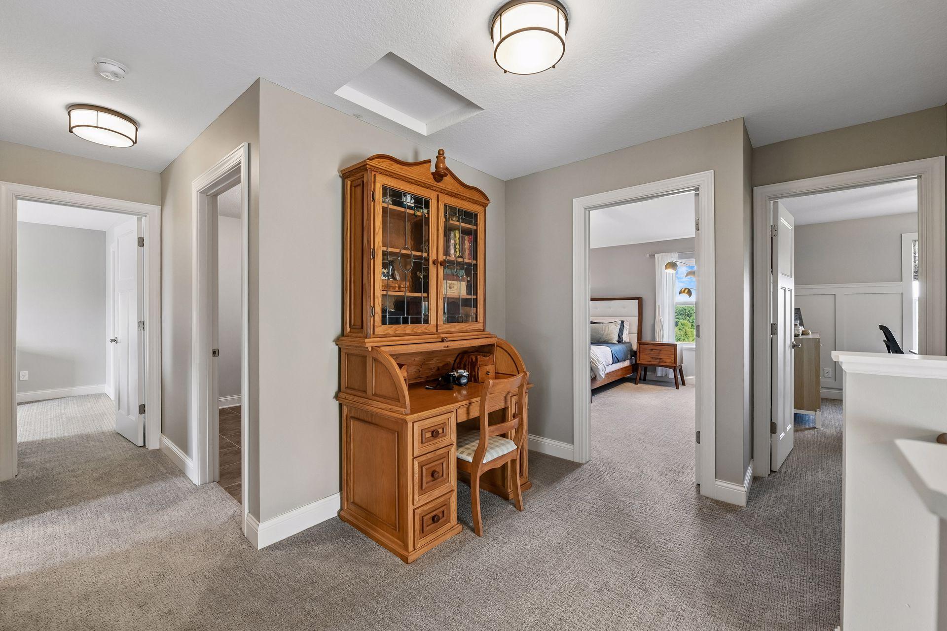 Upstairs landing features fresh paint and new carpet throughout