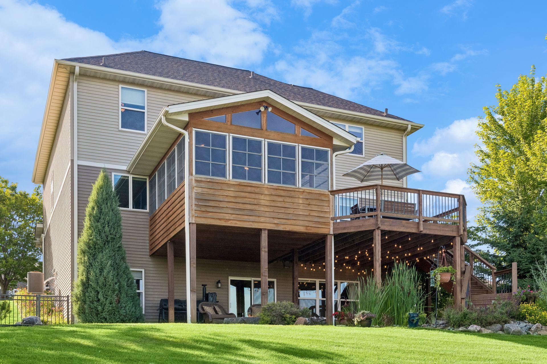 Screened three-season porch, upper deck, and walkout lower level.
