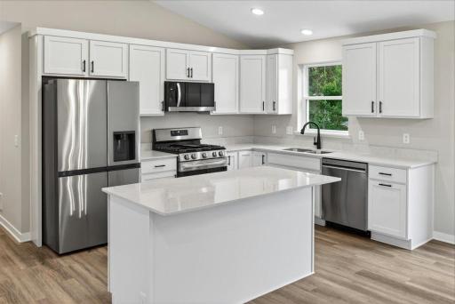 Photo taken of another home with similar plan and finishes.
