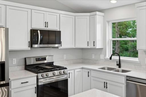 Photo taken of another home with similar plan and finishes.