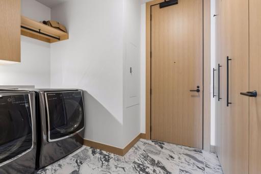 Laundry Room has separate door to allowing for secure access for deliveries.