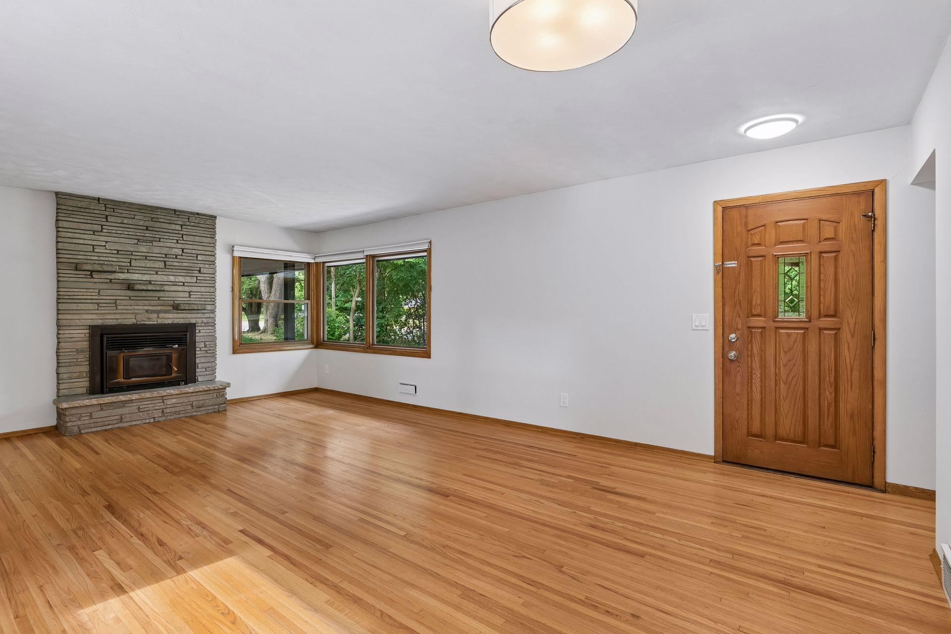 Hardwood floors, freshly painted main floor and updated windows