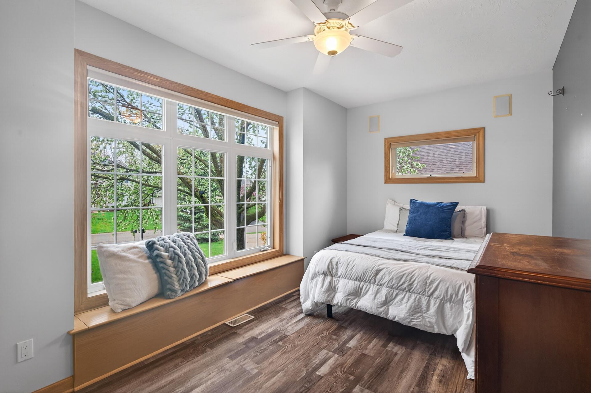 Main level, front bedroom with built-in speakers.