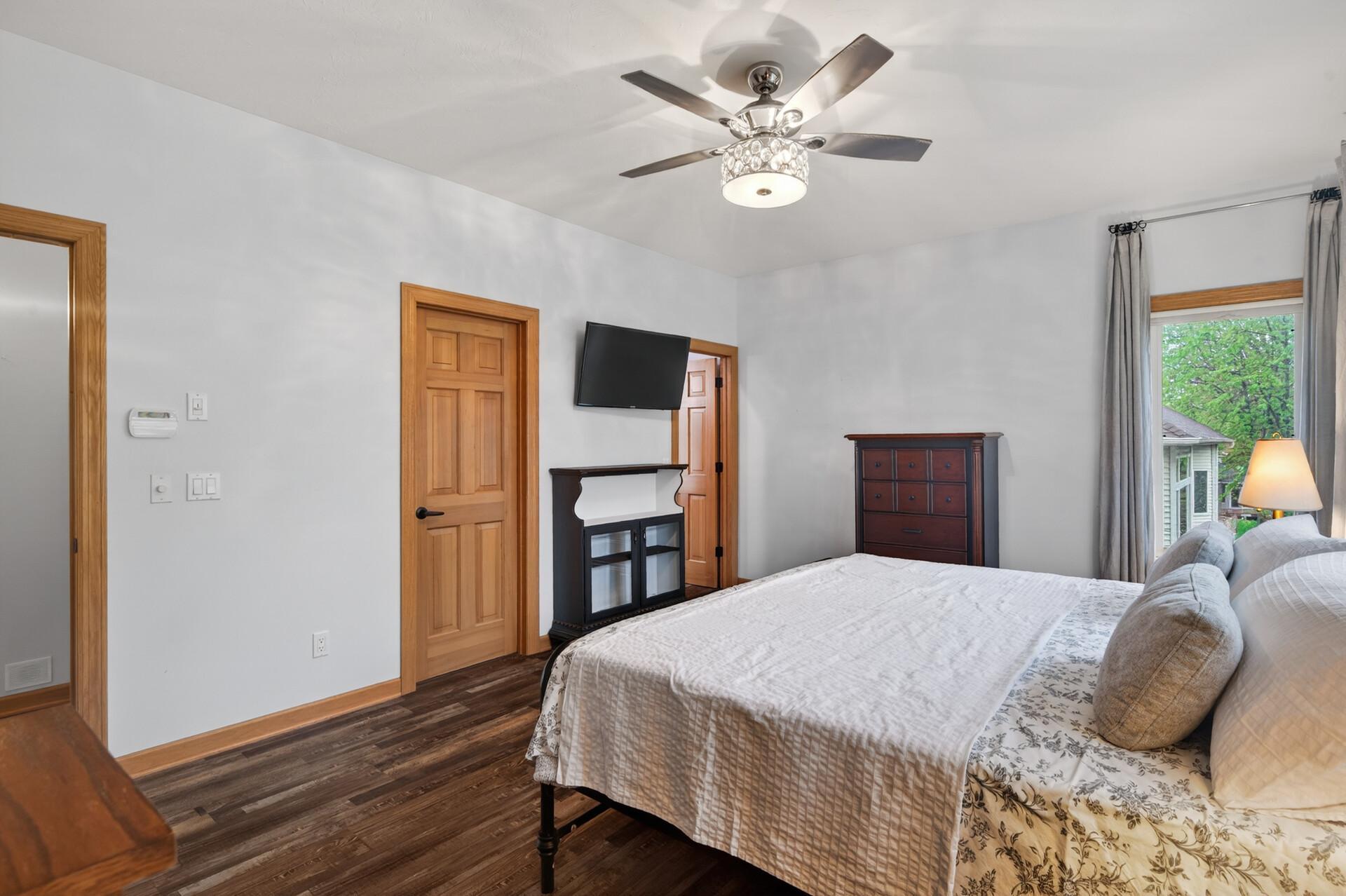 Main floor, primary bedroom with en-suite bathroom.