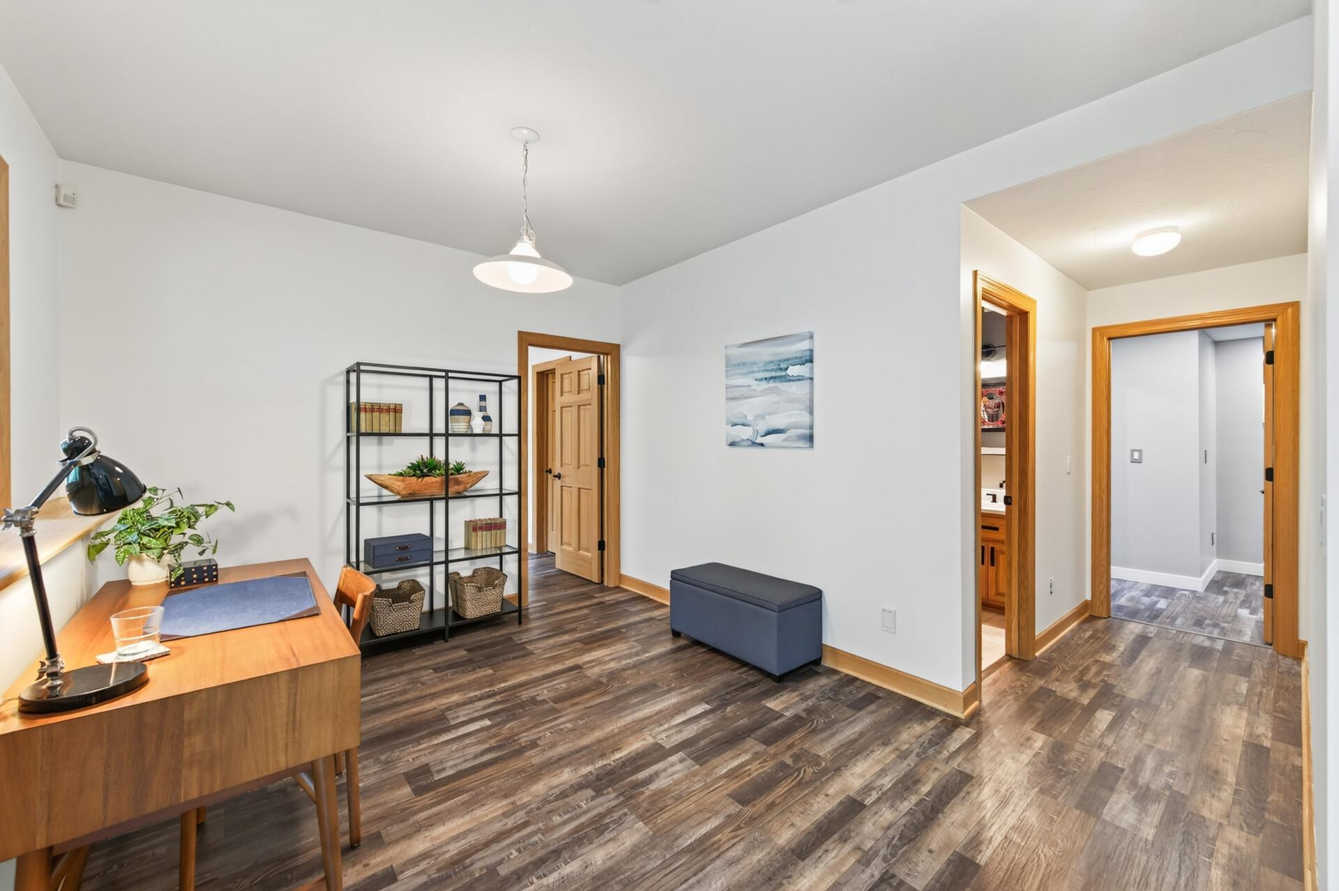 Walk-out basement with 4 separate areas in back and additional kitchen and dining room in front.