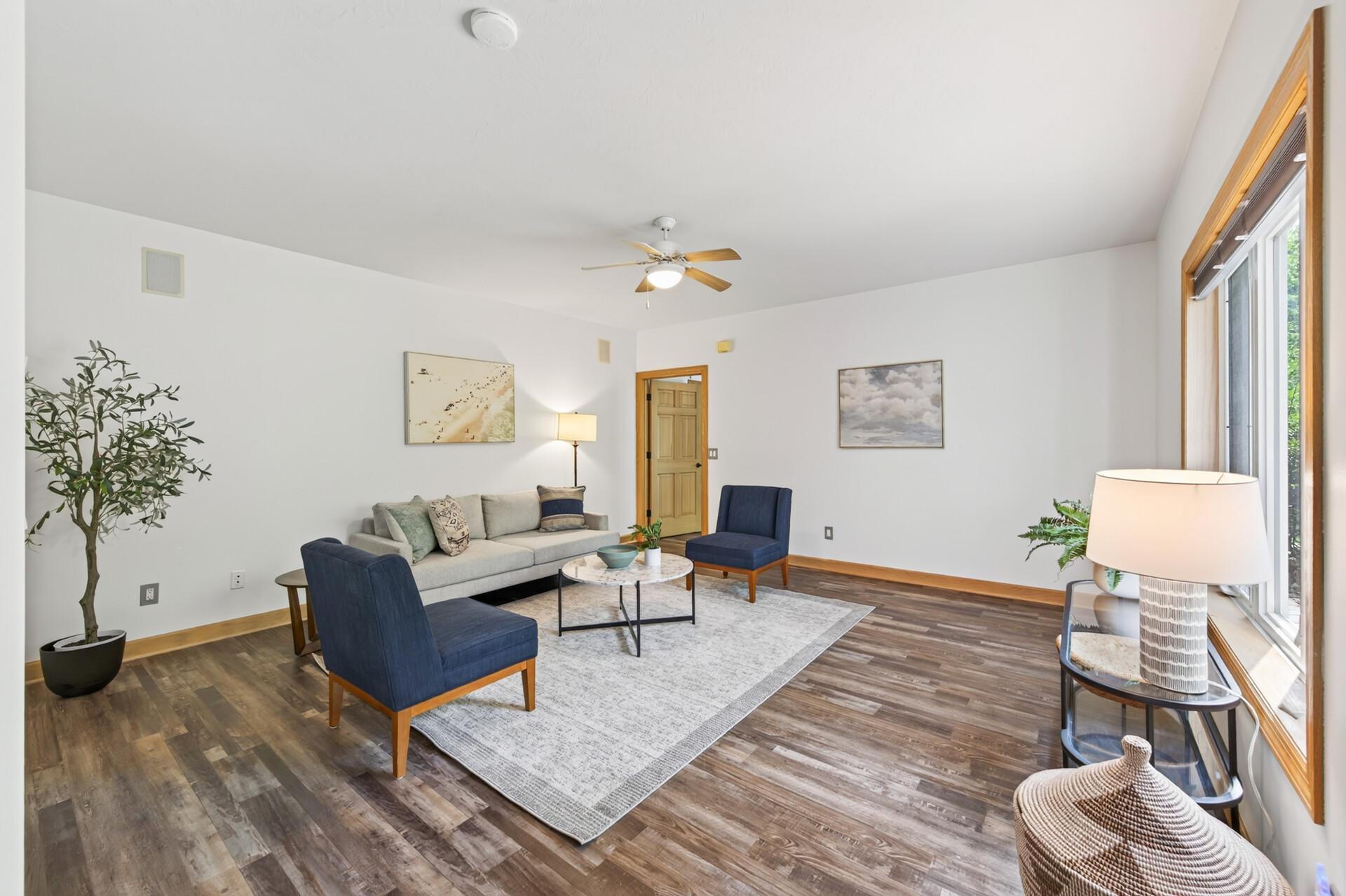 Walk-out basement with 4 separate areas in back and additional kitchen and dining room in front.