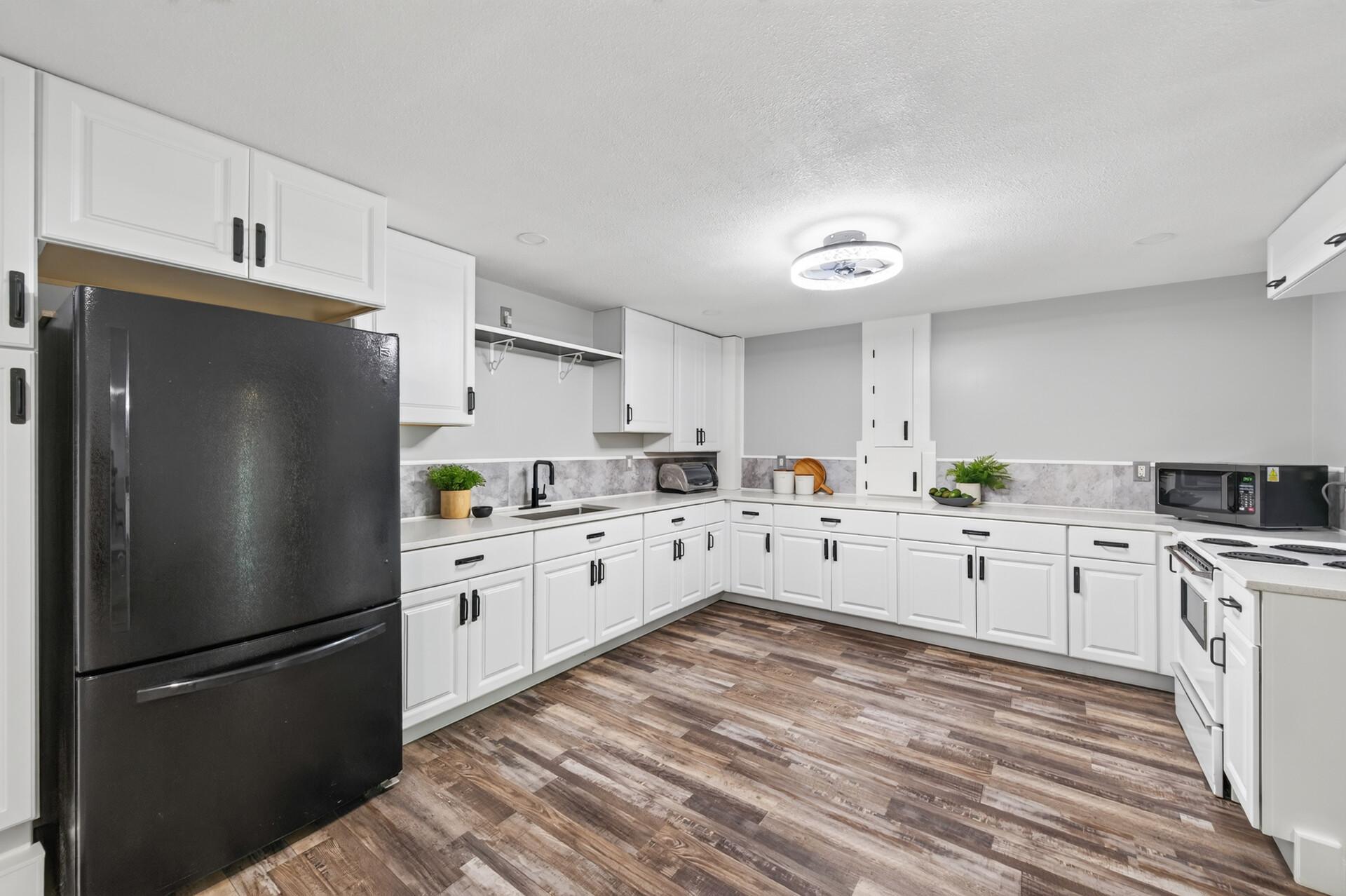 2nd full kitchen in the basement.