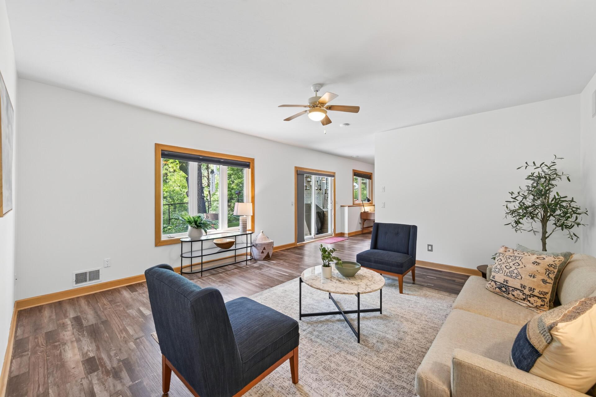 Walk-out basement with 4 separate areas in back and additional kitchen and dining room in front.