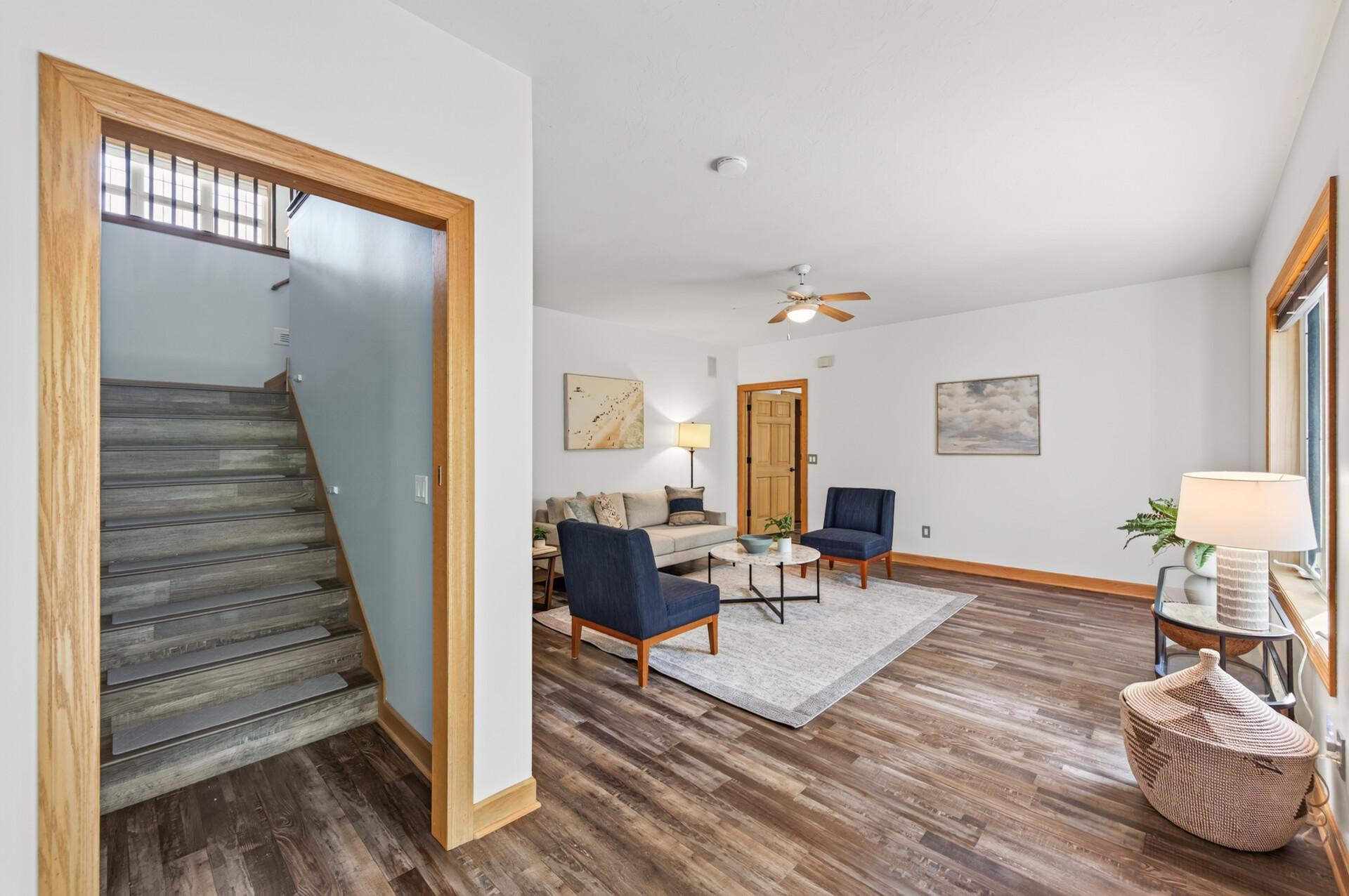 Walk-out basement with 4 separate areas in back and additional kitchen and dining room in front.