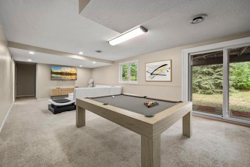 Virtually staged family room down stairs