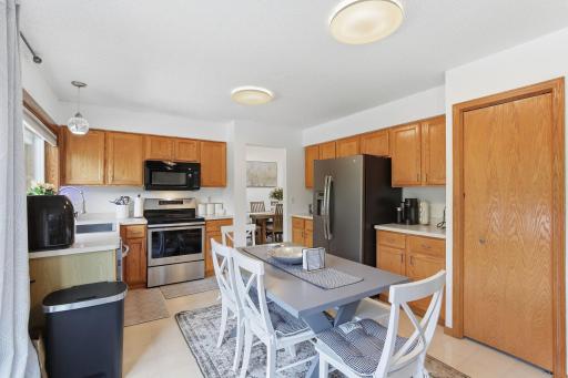 Kitchen with SS appliances -18546-85th-Ave-N-15.jpg