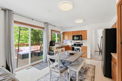 Main level kitchen with access to private deck -18546-85th-Ave-N-14.jpg