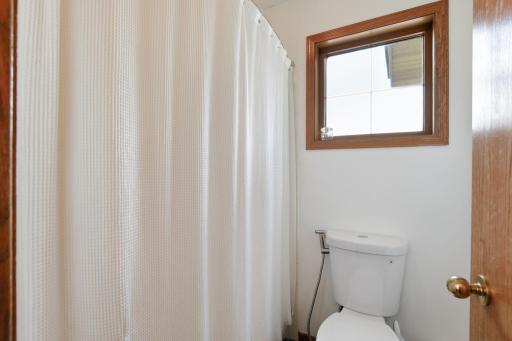 A full bathroom with double vanities on upper level-18546-85th-Ave-N-32.jpg