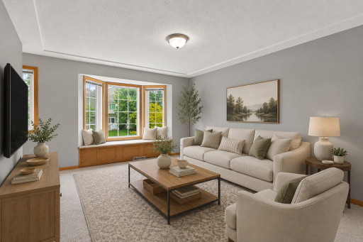 Living room with tons of natural light through bay windows. New carpet & fresh paint (2026). *Photo has been virtually staged for illustrative purposes
