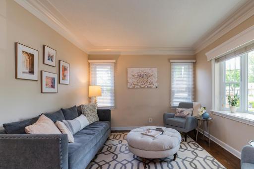 Enjoy the neighborhood through the beautiful bay window.