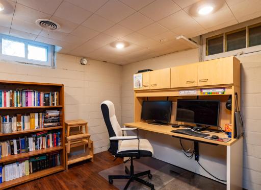 The private lower level office coul dbe converted to a fifth bedroom by adding an egress window.