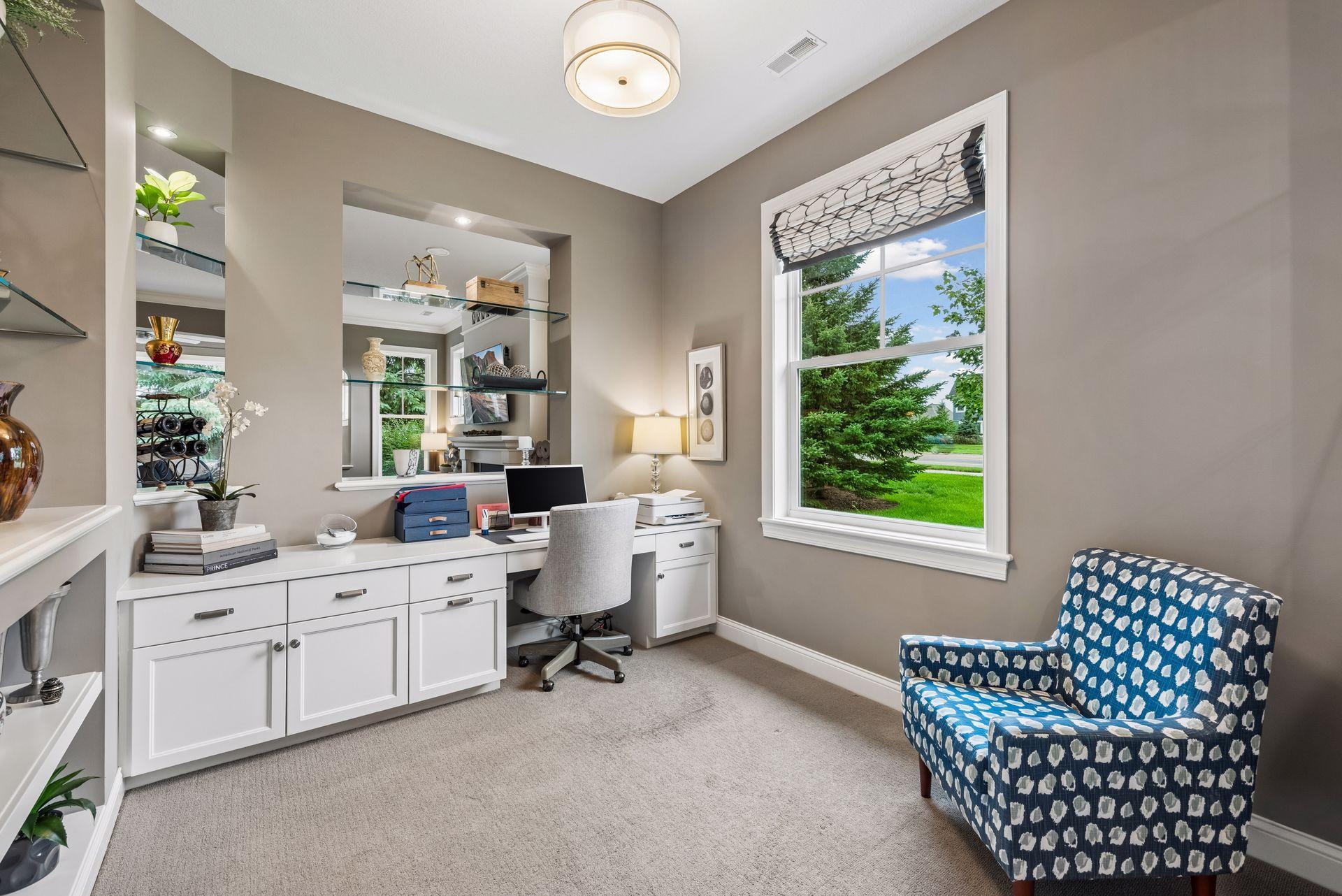 Office space in the front area. It offers great natural lighting as well. Very spacious and has lots of cabinet space for storage and organization.