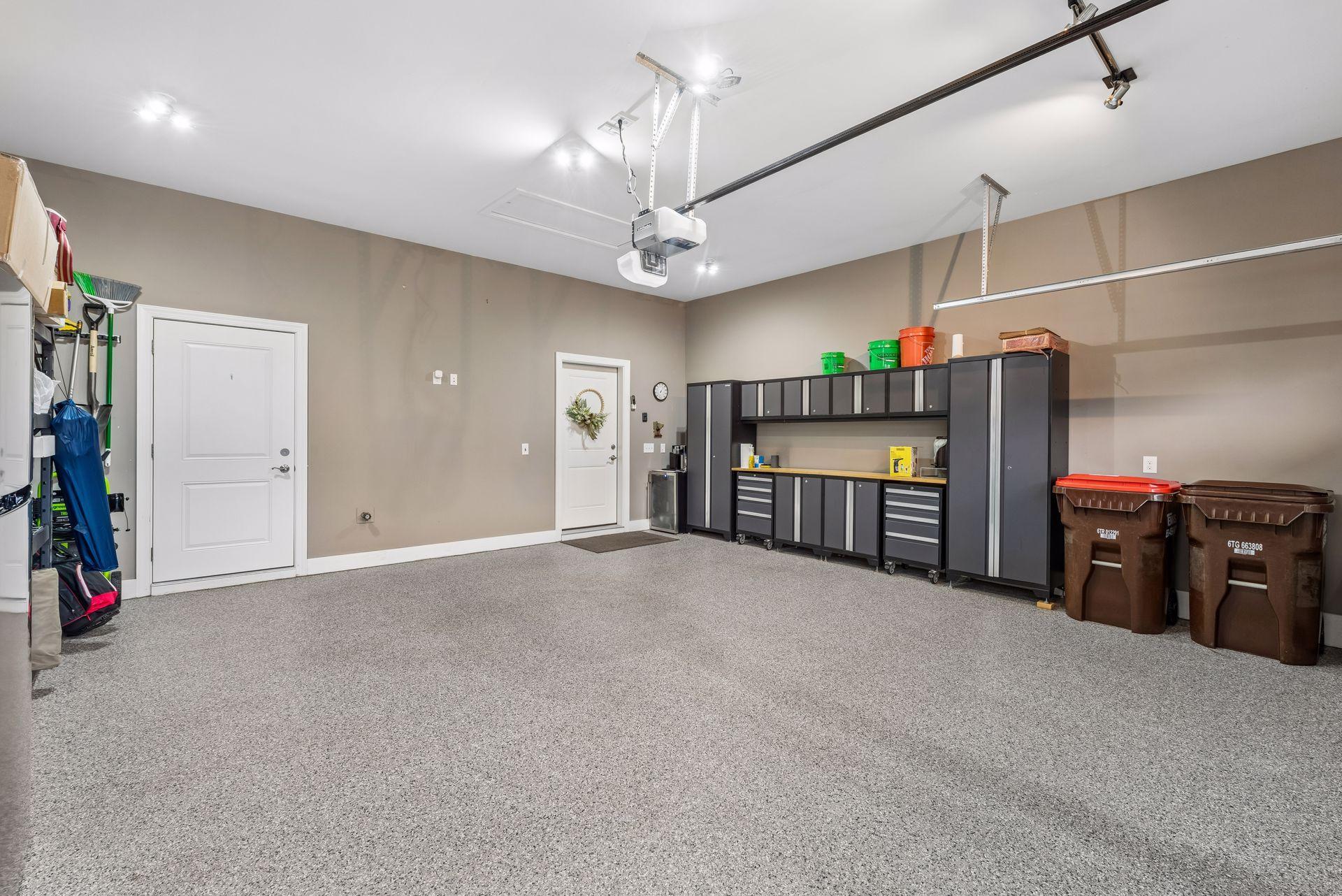 Garage with epoxied garage floor, completely finished with heating and A/C!
