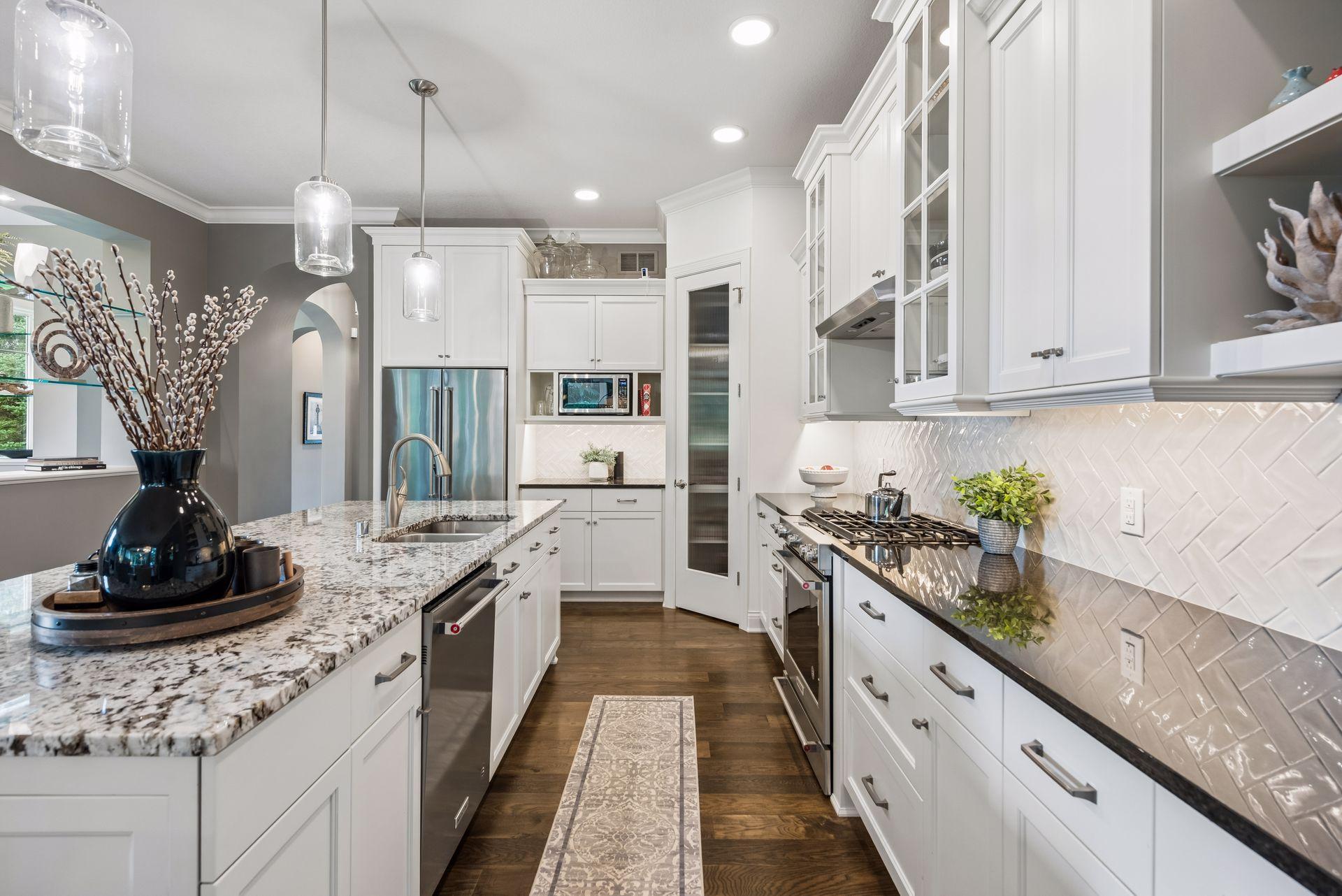 Here highlights all of your cabinet space. Enjoy the nice backsplash and granite countertops.
