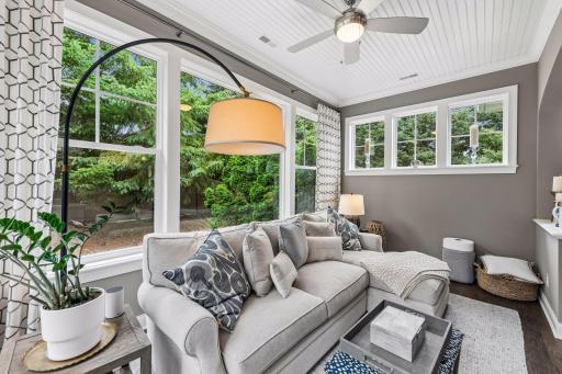 The sunroom is so cozy and beautiful. Views out the window to your yard and patio while the other direction is views of your new beautiful home!
