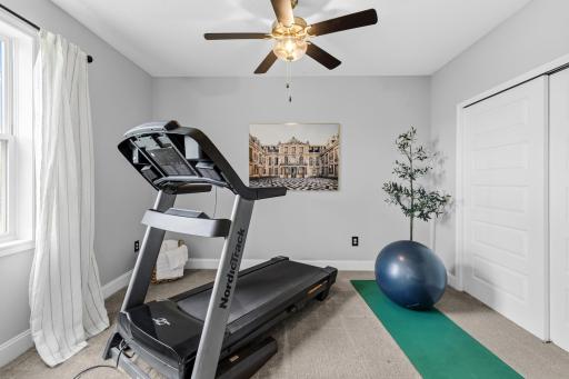 Bedroom #5 is currently being used as a workout room and is located on the lower level.