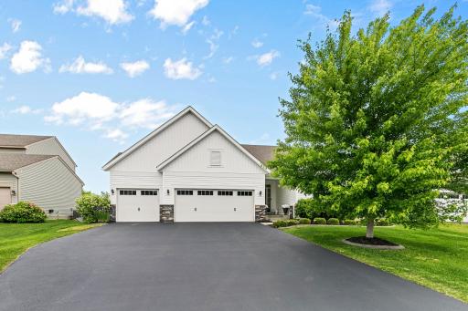 Double wide driveway, maintainance free siding, covered front entry and a three car garage. Custom Govee outdoor/exterior lighting that you can change the colors via an app.