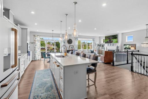 The kitchen of your dreams with new Cafe refrigerator & dishwasher, granite countertops and soft closing drawers and cabinets.