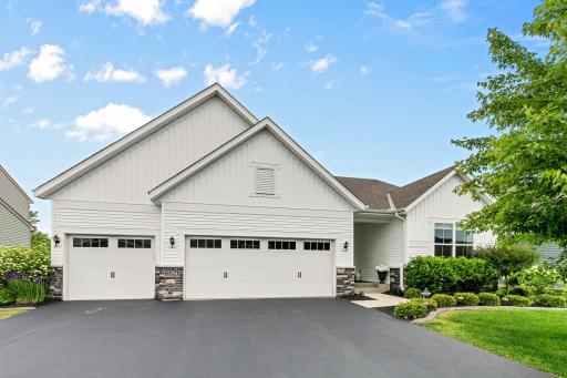 Welcome to this gorgeous executive walk-out rambler that is move in ready with main level living and much larger than it appears.