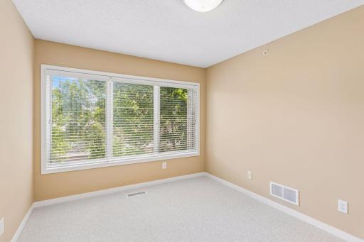 Bedroom 2 of 3 on the second floor is spacious and faces west. Its large closet is not shown above.