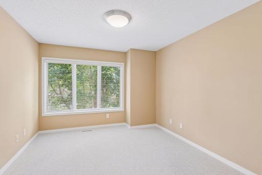 Bedroom 3 of 3 on the second floor is also spacious and boasts a large bank of windows facing east. Its generous-size closet is not shown above. All rooms are immaculate and in move-in condition.