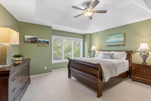 The spacious bedroom currently accommodates a second, large, dresser and seating (not shown)
