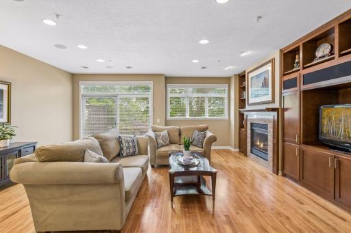 Photographs can be deceiving. Merely shift the furniture towards the cabinetry, & you can easily fit a dining table behind the sofa & additional seating or a work surface under the trio of windows