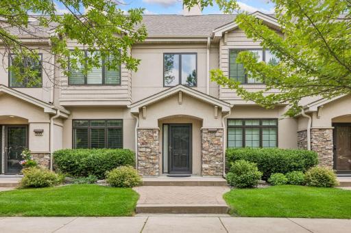 Welcome to 519 Willoughby Way W in Minnetonka, a beautiful neighborhood comprised of four distinctly different types of townhomes! #519 features its own private entrance from the street (shown) and from the underground garage.