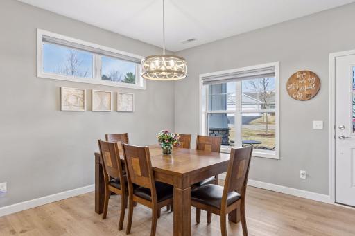 Sunlit dining room with clean, modern finishes