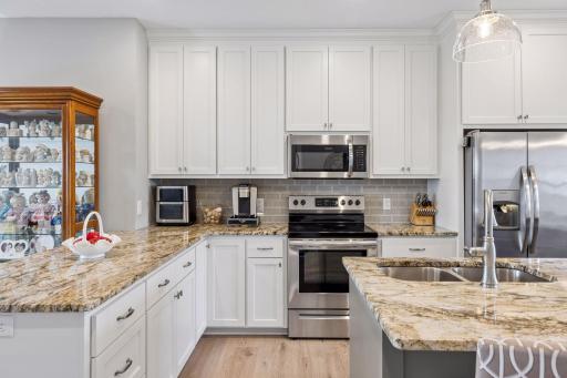 To the ceiling cabinetry for ample storage