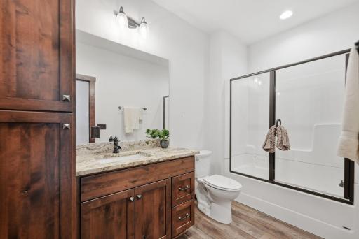 Beautifully finished bathrooms throughout the home reflect the same quality craftsmanship found in every space.