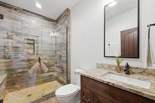 Beautifully finished bathrooms throughout the home reflect the same quality craftsmanship found in every space.