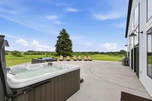 Relax beneath the stars in the private hot tub after a day of hunting, fishing, or exploring the estate.