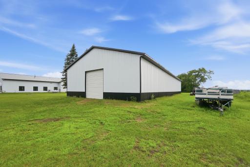 The impressive 60' Ã 100' outbuilding provides exceptional flexibility for equipment, collections, recreational vehicles, workshop space, or future expansion.