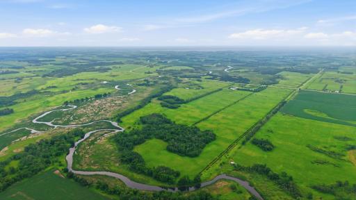 Bordering nearly 700 acres of state land, this meticulously managed property offers an exceptional combination of privacy, habitat, and expanded recreational opportunities rarely found in one ownership