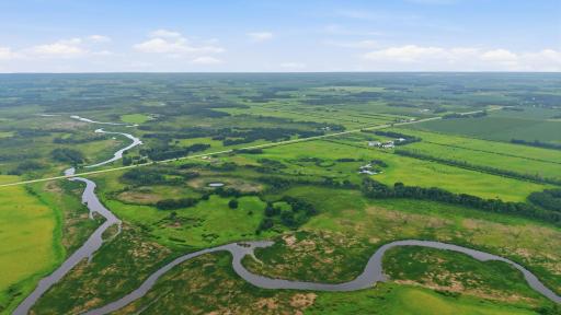 The Long Prairie River winds through this extraordinary estate, offering river frontage, established wildlife habitat, stocked pond, food plots, and exceptional hunting opportunities.