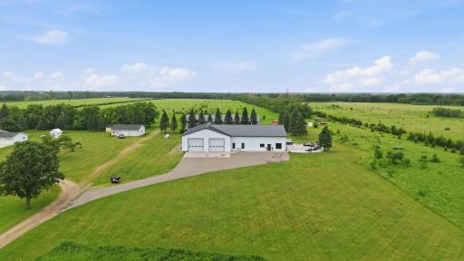 Custom lodge. Nearly 375 acres. Long Prairie River frontage. Stocked pond. Food plots. Established deer stands. Contiguous to nearly 700 acres of state land. A truly extraordinary offering.
