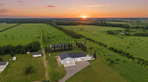 Custom lodge. Nearly 375 acres. Long Prairie River frontage. Stocked pond. Food plots. Established deer stands. Contiguous to nearly 700 acres of state land. A truly extraordinary offering.